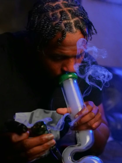a man with dreadlocks smoking a cigarette, trending on pexels, holding green fire, thicc build, water pipe, playboi carti