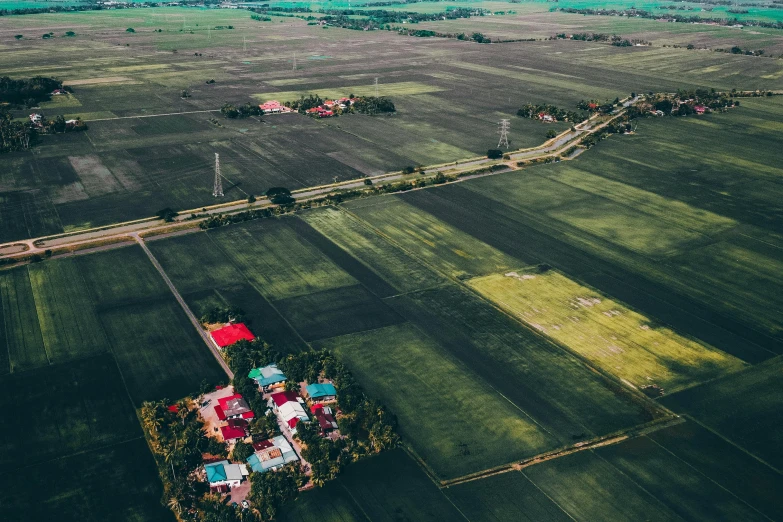 an aerial view of a farm in a rural area, pexels contest winner, soviet suburbs, ground angle uhd 8 k, instagram post, a green