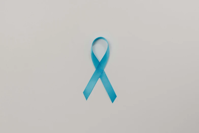 a blue ribbon on a white background, by Gavin Hamilton, pexels, instagram picture, medical photography, on a gray background, turqouise