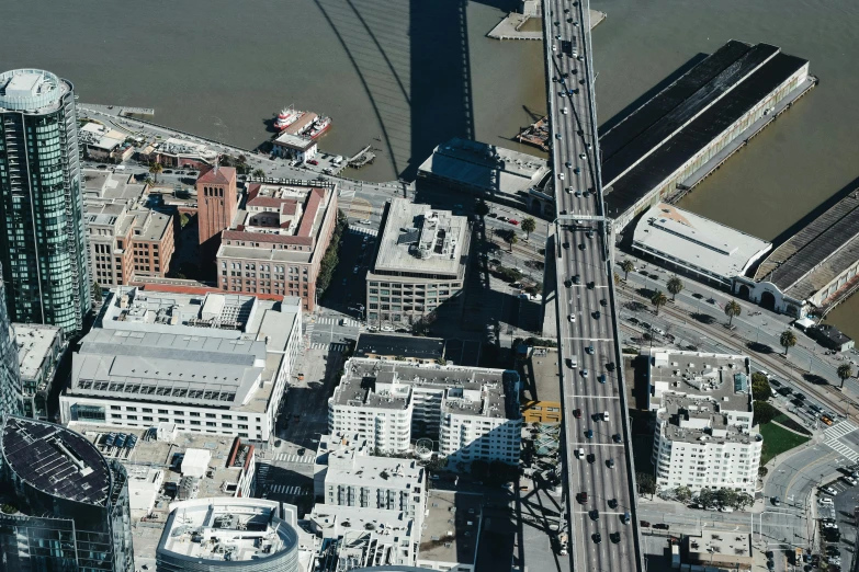 a view of a city from the top of a building, reddit, photorealism, city bay bridge aqueduct, 2 0 2 2 photo, airborne view, highresolution