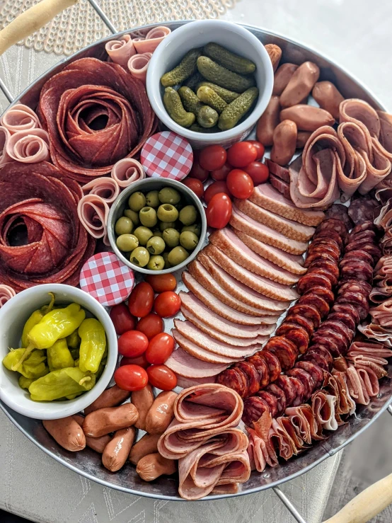 a platter of meats and vegetables on a table, pickles, profile pic, flatlay, 6 pack