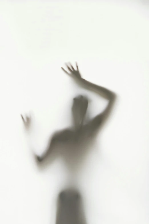a shadow of a person holding a tennis racquet, inspired by Anna Füssli, conceptual art, transparent ghost screaming, hair floating covering chest, white backdrop, waving hands