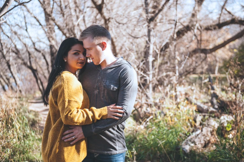 a man and a woman standing next to each other, unsplash, romanticism, new mexico, realistic », fan favorite, warm spring