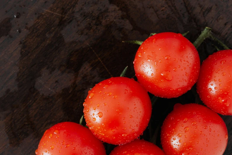 a bunch of tomatoes sitting on top of a wooden table, avatar image, extra crisp image, thumbnail, dewy skin