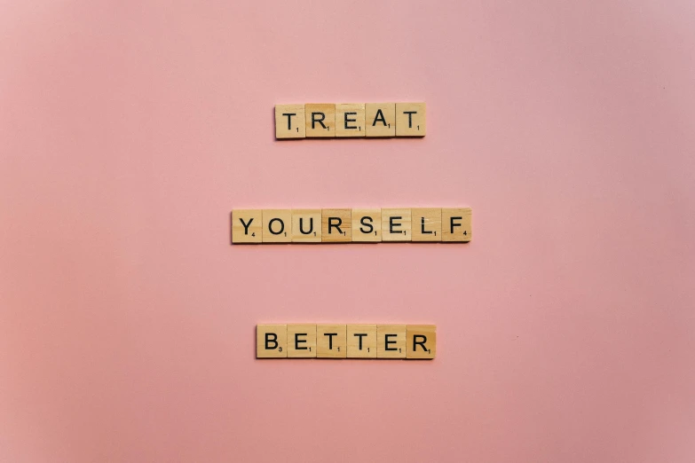 a pink wall with scrabbles spelling treat yourself better, trending on pexels, aestheticism, on a pale background, 🎀 🧟 🍓 🧚, inspirational quote, self centered