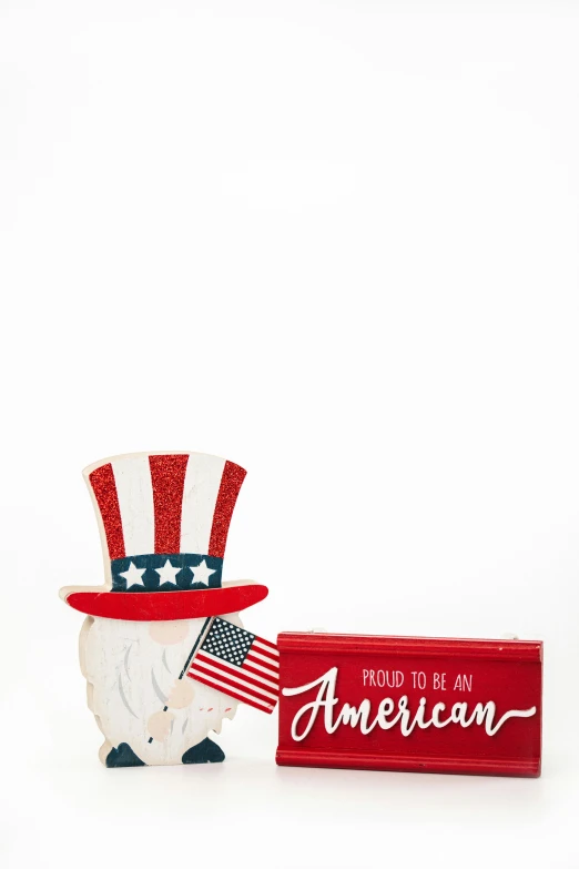 a wooden sign that says proud to be an american, inspired by Americo Makk, pouches, hand holding cap brim, 3 - piece, red and white