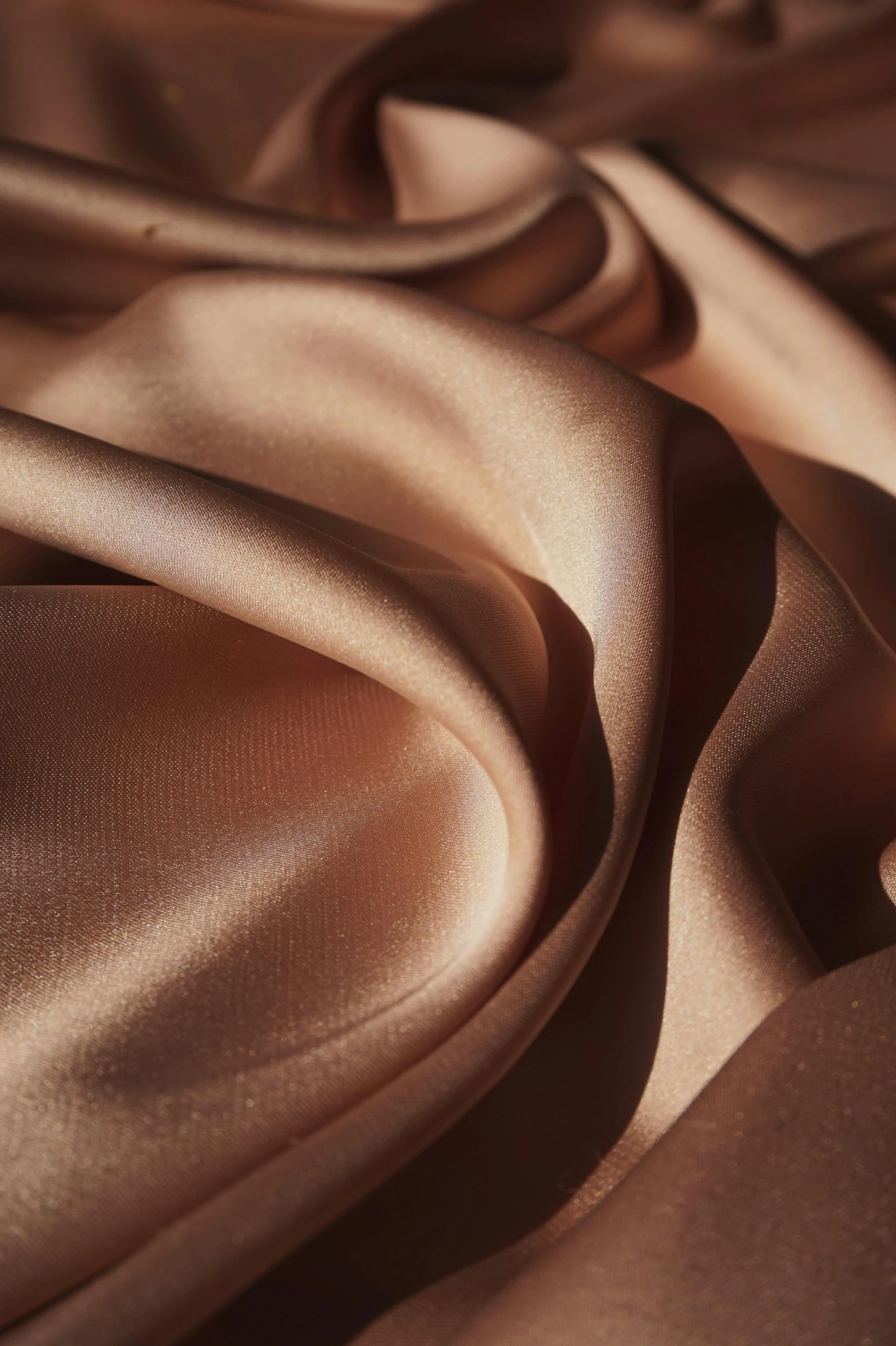 a close up of a brown satin fabric, inspired by Alexandre Cabanel, trending on unsplash, light blush, copper, portrait shot, pink