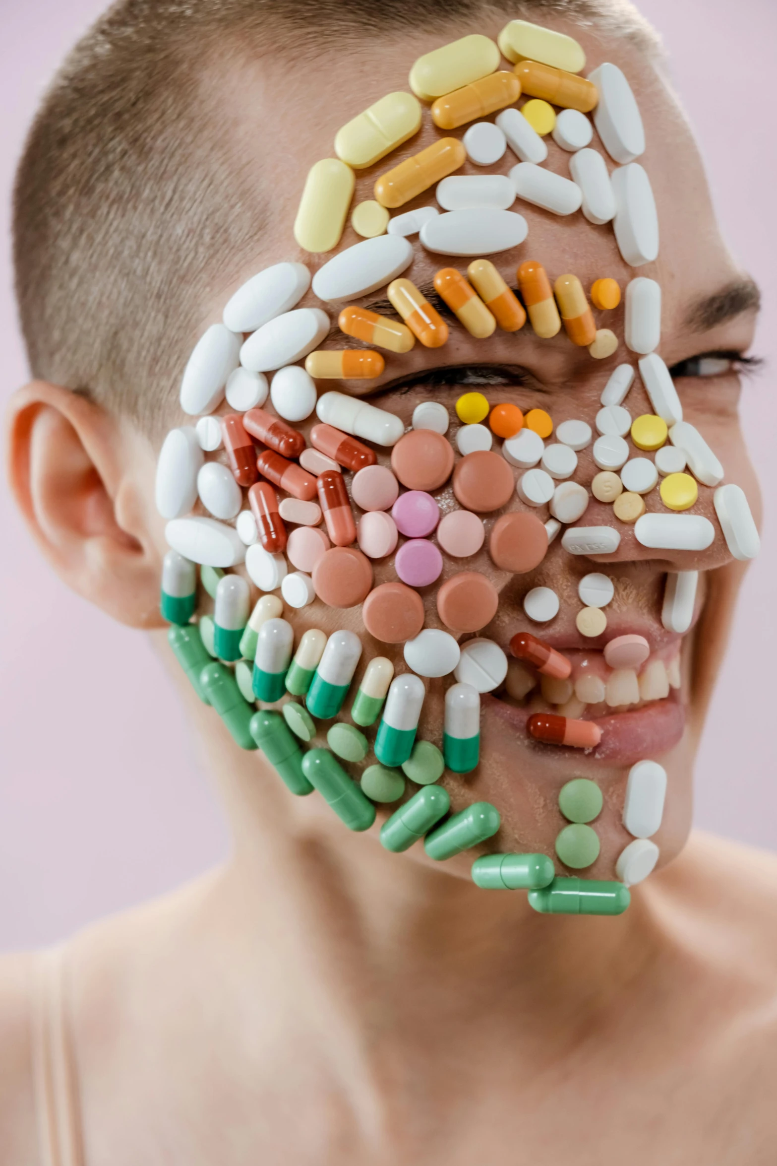 a man with lots of pills on his face, inspired by Damien Hirst, trending on pexels, antipodeans, square masculine jaw, boy, ilustration, drag