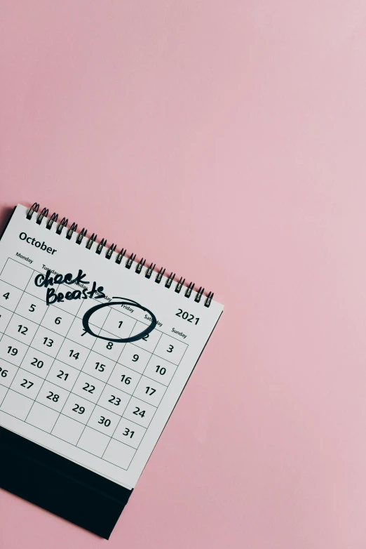 a calendar sitting on top of a pink surface, happening, 2 5 6 x 2 5 6, black, thumbnail, chalk