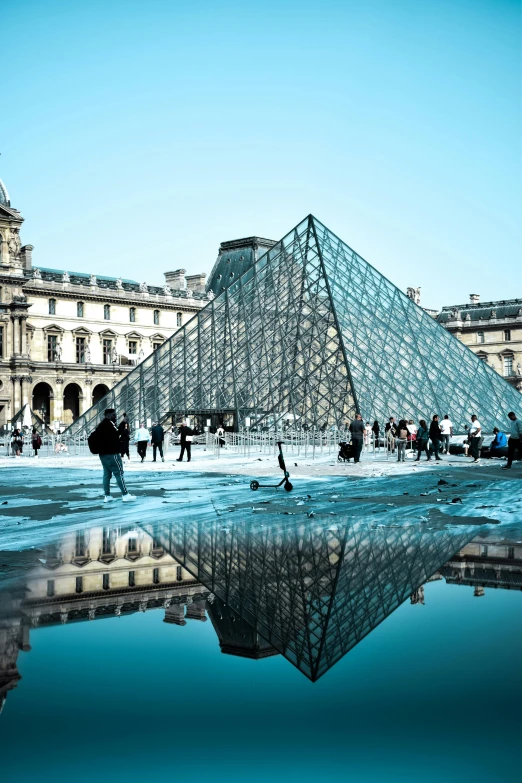 a group of people standing in front of a glass pyramid, french architecture, slide show, square, walking down