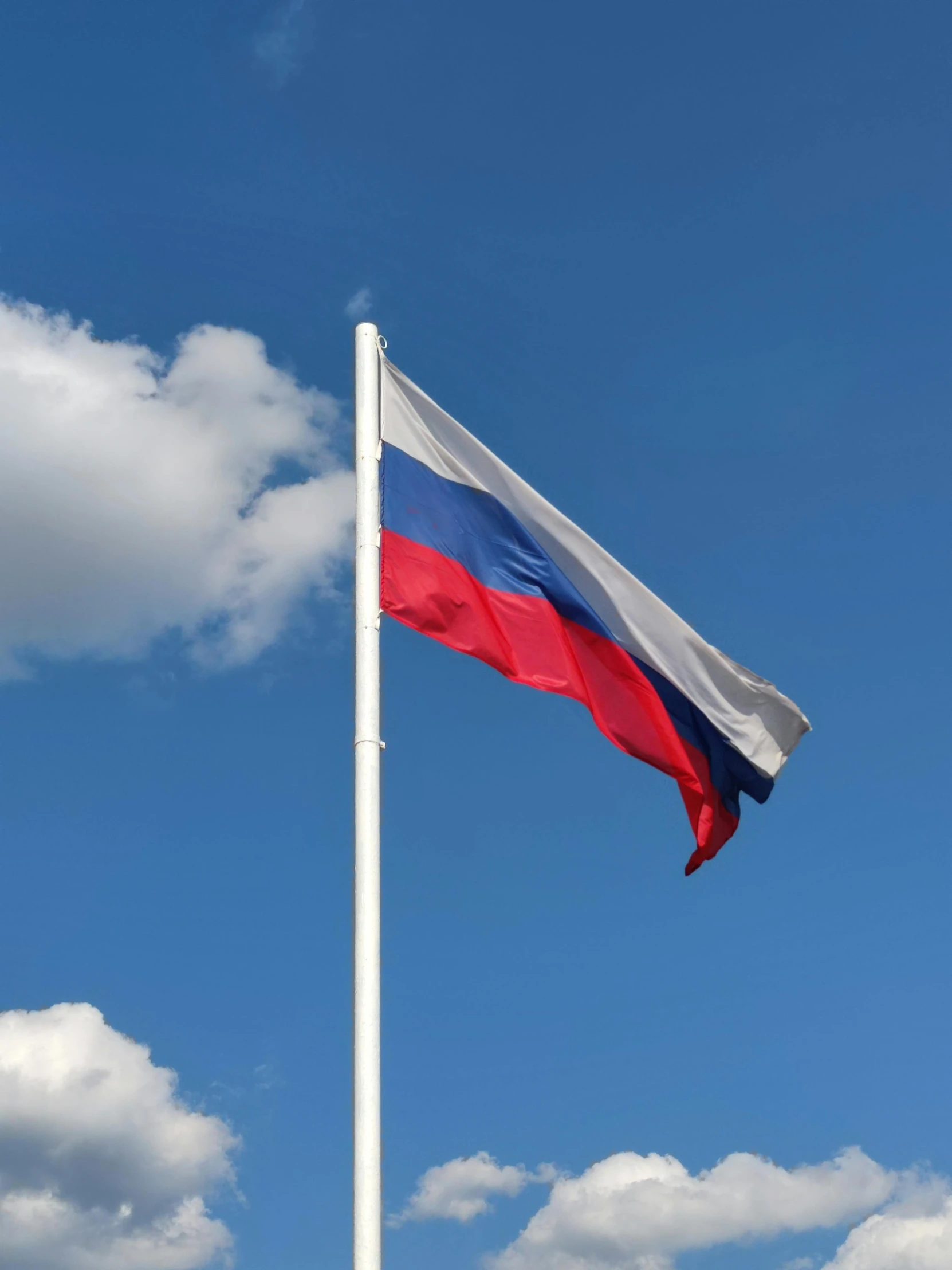 the russian flag is flying high in the sky, an album cover, by Jan Rustem, unsplash, renaissance, square, high-quality photo, photo on iphone, 5 feet away