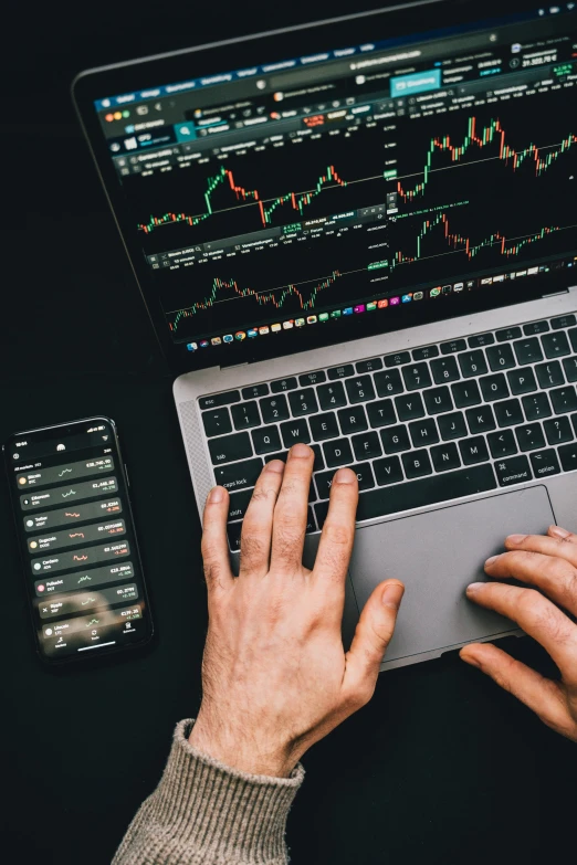 a close up of a person typing on a laptop, trending on pexels, analytical art, currency symbols printed, traders, backdrop, mount