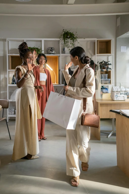 a group of women standing next to each other in a room, happening, designer product, surprising, at checkout, wearing white cloths