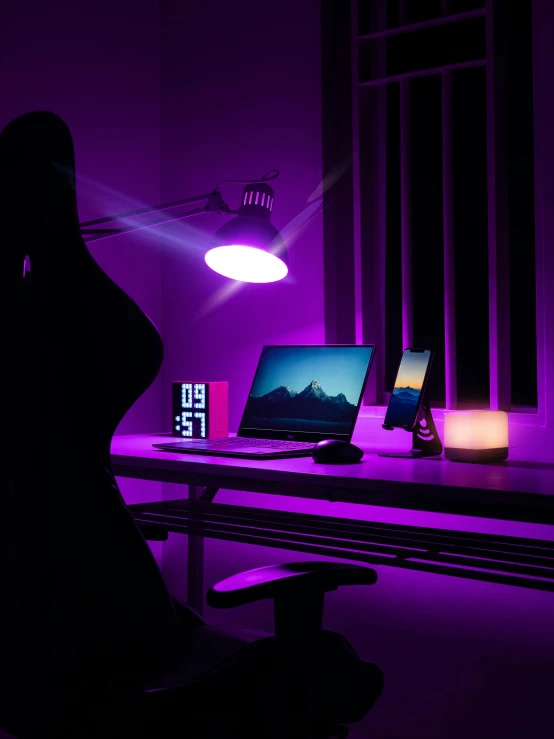 a woman standing in front of a desk with a laptop on it, poster art, by Adam Rex, light and space, purple scene lighting, fuschia leds, sweet night ambient, ufo lighting