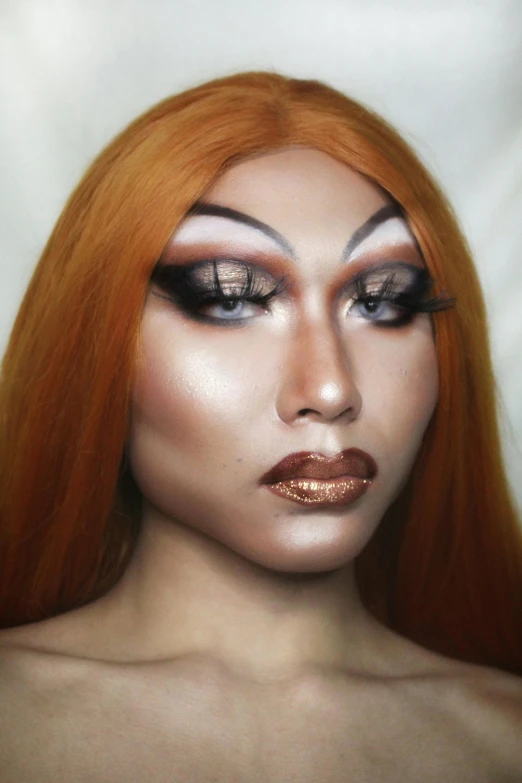 a close up of a woman with orange hair, an album cover, inspired by Sasha Putrya, trending on pexels, lowbrow, drag queen, malaysian, metallic bronze skin, full makup