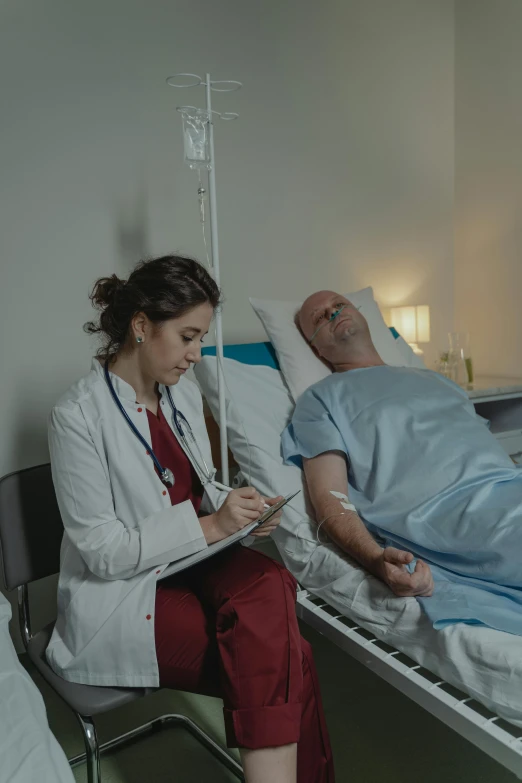 a woman sitting next to a man in a hospital bed, a colorized photo, pexels contest winner, paul barson, scene from live action movie, background image, inspect in inventory image