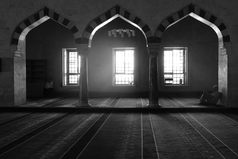 a black and white photo of a mosque, pexels, hurufiyya, brightly lit room, warm sunlight shining in, stained”, floor