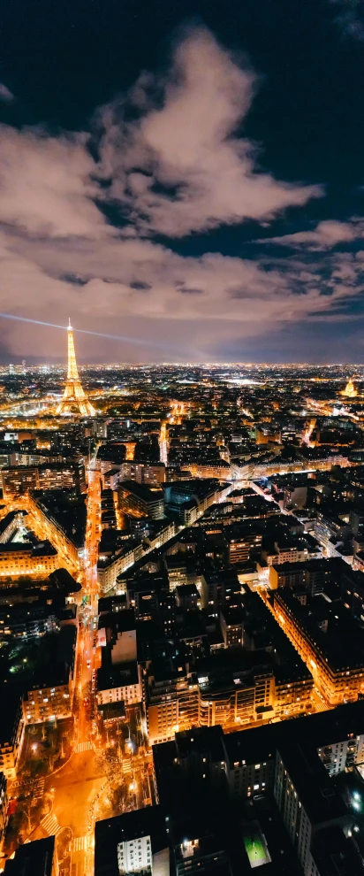 an aerial view of a city at night, by Adam Rex, pexels contest winner, art nouveau, eiffel tower left, 15081959 21121991 01012000 4k, plain background, multiple stories