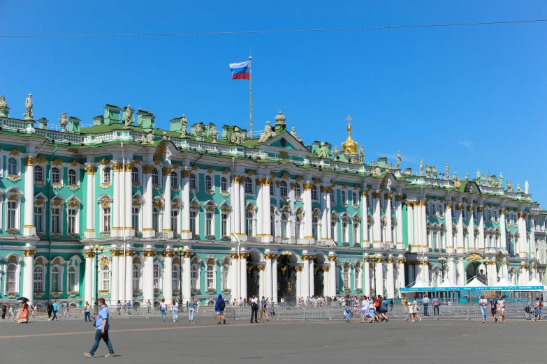 a large building with a flag on top of it, inspired by Vasily Surikov, neoclassicism, green and blue, slide show, square