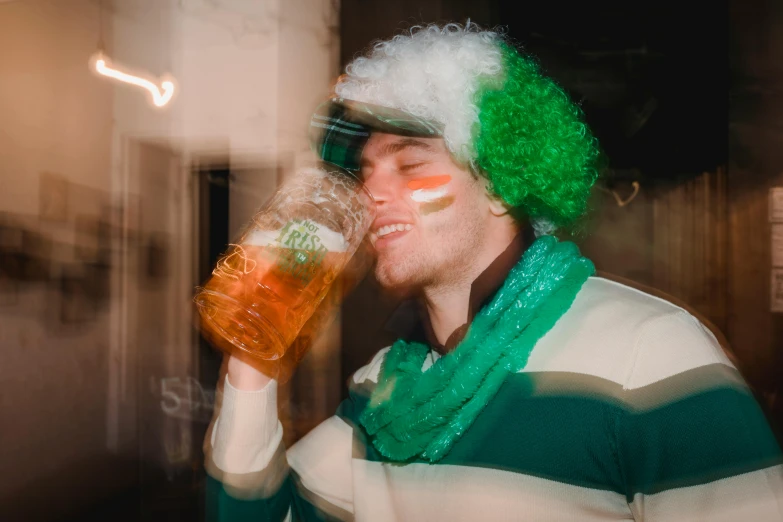 a man in a green and white hat drinking a beer, pexels contest winner, irish, flashing lights, 🚿🗝📝, profile image