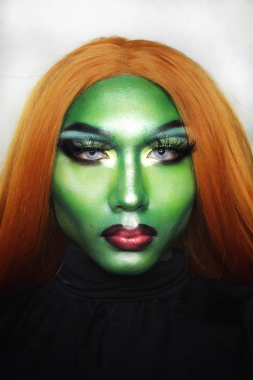 a woman with green makeup and orange hair, inspired by Jessie Alexandra Dick, lucio as a woman, gamora, drag, instagram post