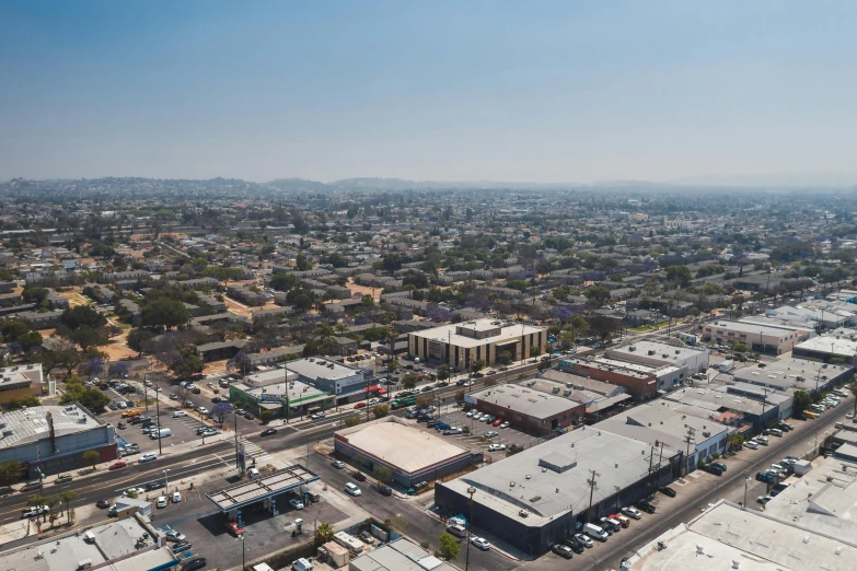 an aerial view of a city with lots of buildings, a portrait, unsplash, photorealism, 1600 south azusa avenue, view from side, high res 8k, ultrawide cinematic