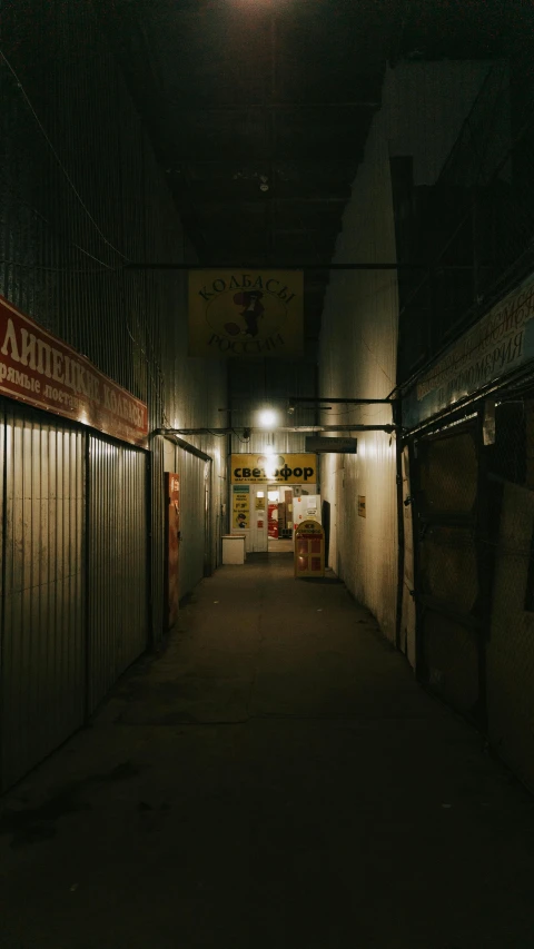 a long hallway with a light at the end of it, inspired by Elsa Bleda, unsplash contest winner, graffiti, dimly lit dive bar, long shot kodak portra 4 0 0, downtown mexico, high quality photo