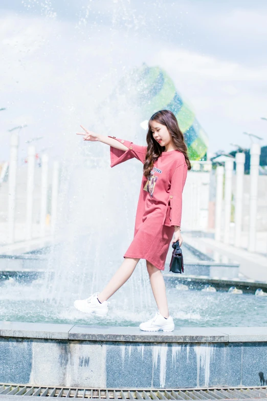 a woman in a pink dress standing in front of a fountain, a picture, by Cherryl Fountain, pexels contest winner, happening, cute casual streetwear, ulzzang, full body:: sunny weather::, profile pic