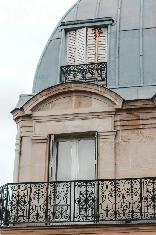 a clock that is on the side of a building, inspired by Henri Alphonse Barnoin, trending on unsplash, paris school, balcony door, dome, bay window, exterior view