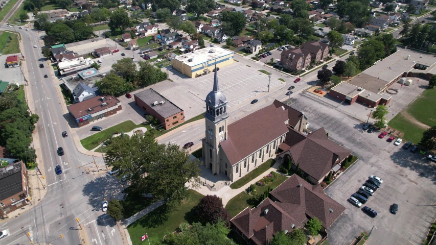 an aerial view of a small town with a clock tower, by Joe Stefanelli, square, church, 8 k -, ultra wide-shot