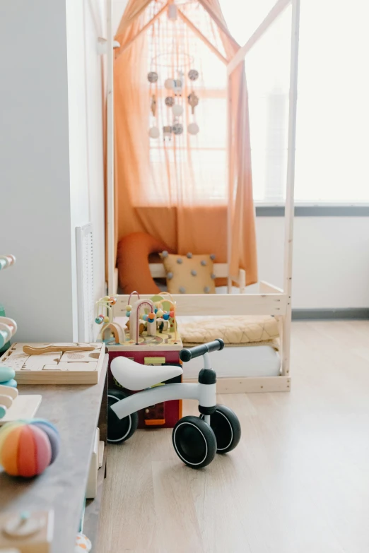 a small child's room with toys on the floor, trending on unsplash, light and space, medium shot taken from behind, chariot, panoramic shot, profile image