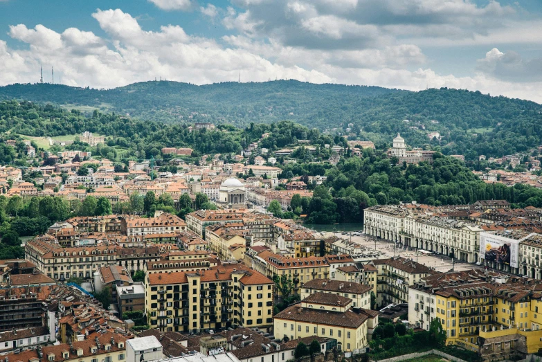 a view of a city from the top of a hill, by Patrick Pietropoli, pexels contest winner, renaissance, square, bizzaro, ai weiwei and gregory crewdson, bright sunny day