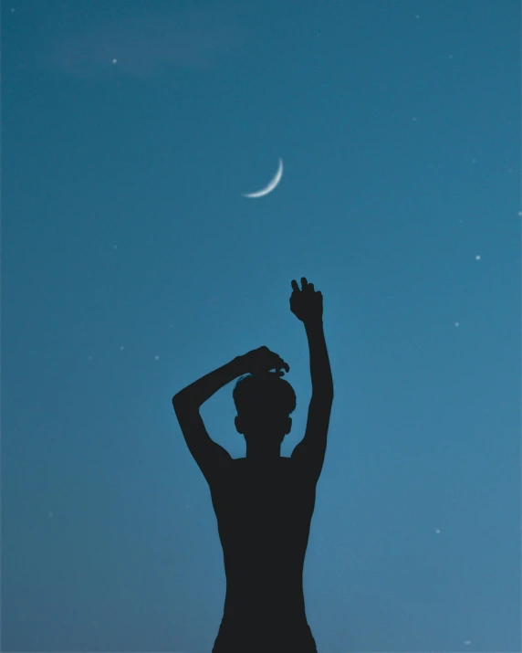 a silhouette of a man reaching up to the moon, by Julia Pishtar, unsplash contest winner, aestheticism, ☁🌪🌙👩🏾, cloudless sky, midnight color palette, bare shoulders