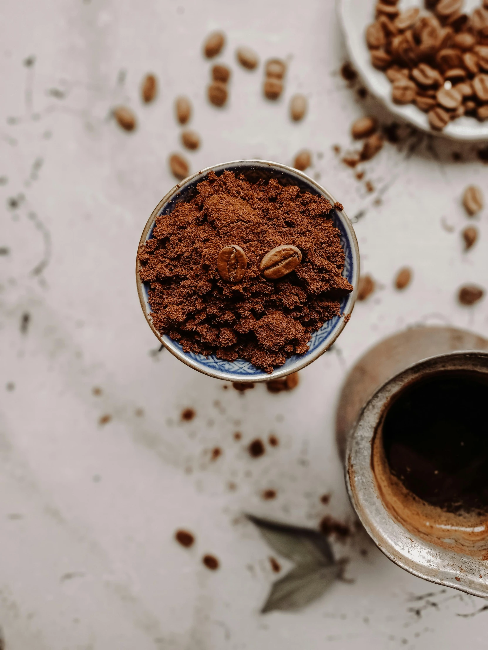 a couple of cups of coffee sitting on top of a table, product image, ground broken, a close up shot, recipe