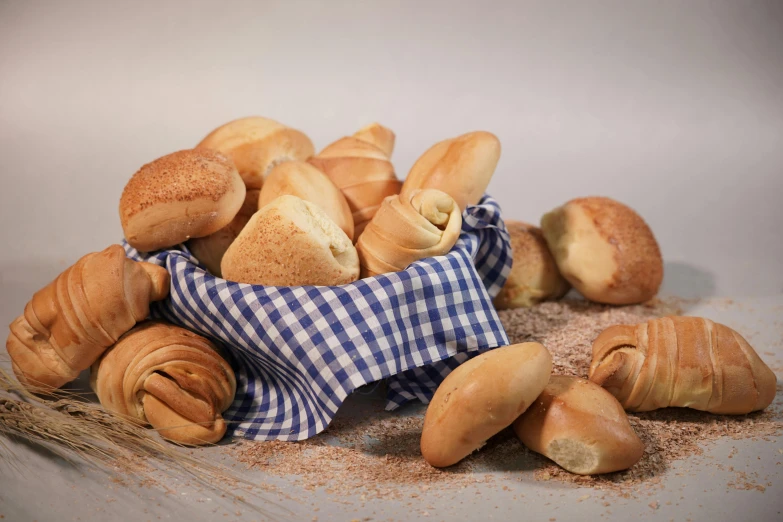 a pile of bread sitting on top of a table