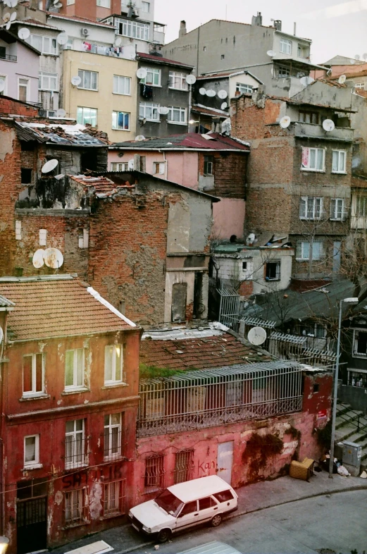 a bunch of buildings that are next to each other, an album cover, inspired by Elsa Bleda, pexels contest winner, renaissance, turkey, 4 k photo autochrome, shot from roofline, multi chromatic