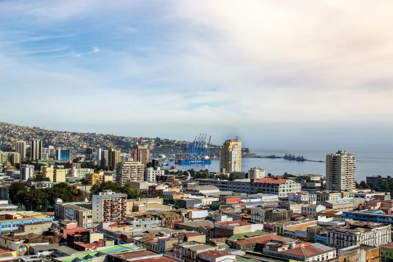 a view of a city from the top of a building, by Daniel Lieske, pexels contest winner, south african coast, chile, port scene background, panoramic