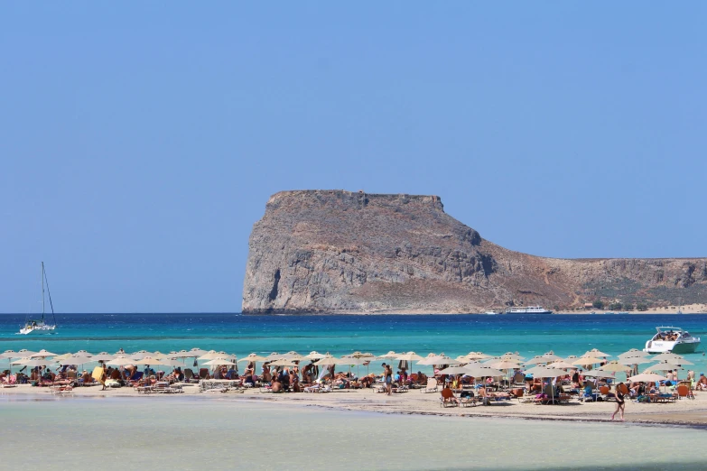 a beach filled with lots of people and umbrellas, a photo, inspired by Exekias, pexels contest winner, 🚿🗝📝, square, the greek goddess aphrotite, recipe