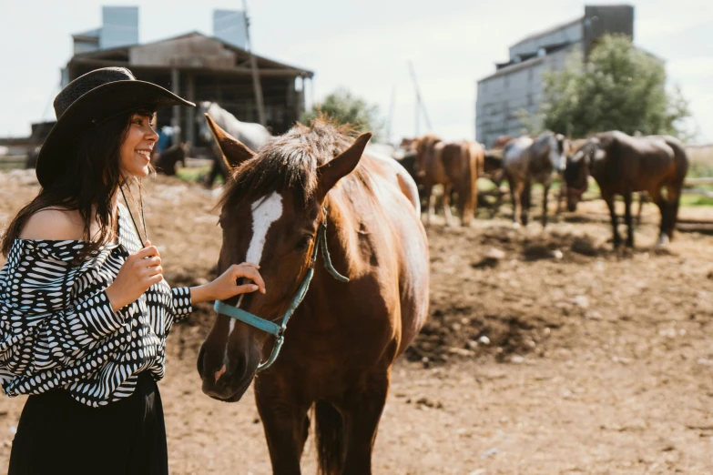 a woman standing next to a brown horse, pexels contest winner, 🦩🪐🐞👩🏻🦳, japanesse farmer, cowboy style, thumbnail