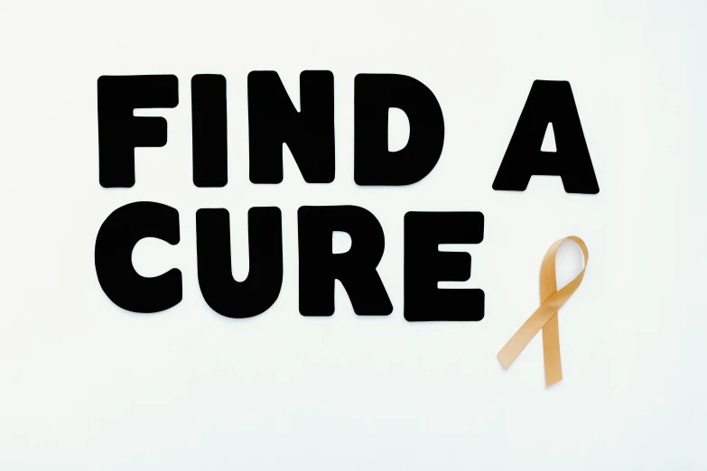 a sign that says find a cure with a yellow ribbon, a picture, (light orange mist), ad image, mundane, papyrus