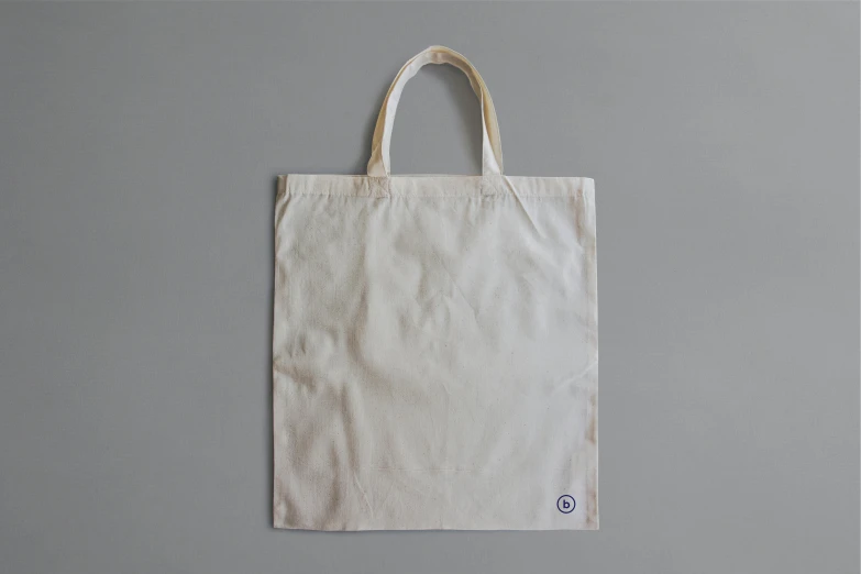 a white bag sitting on top of a table, inspired by Hasegawa Tōhaku, unsplash, square, facing front, hero shot, unframed