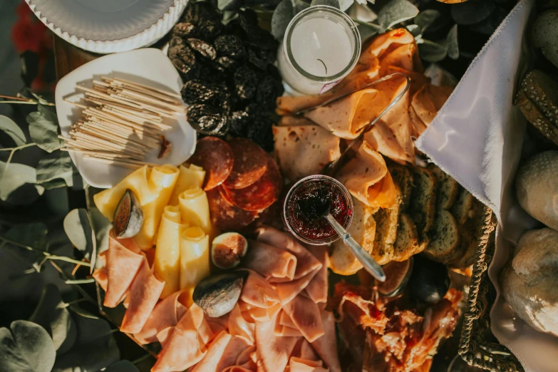 a bunch of food sitting on top of a table, by Carey Morris, pexels contest winner, eating a cheese platter, 🦩🪐🐞👩🏻🦳, late afternoon sun, avatar image