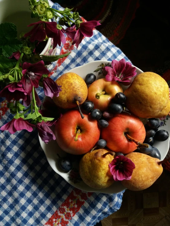 a bowl of fruit sitting on top of a table, fruit and flowers, photograph taken in 2 0 2 0, pears, high quality product image”