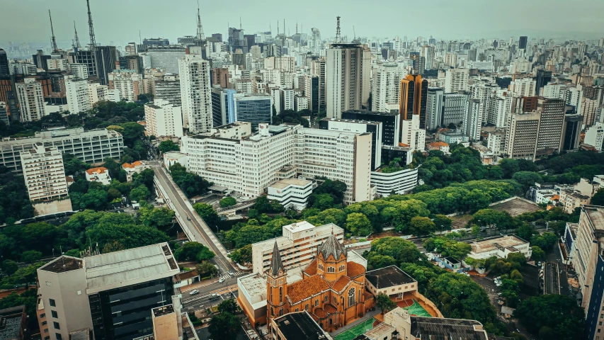 a view of a city from the top of a building, by Ceferí Olivé, edu souza, flatlay, parks and monuments, 90s photo