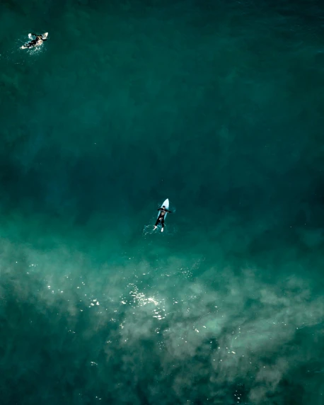 a couple of people riding surfboards on top of a wave, by Sebastian Spreng, unsplash contest winner, airplane view, thumbnail, floating. greenish blue, manly