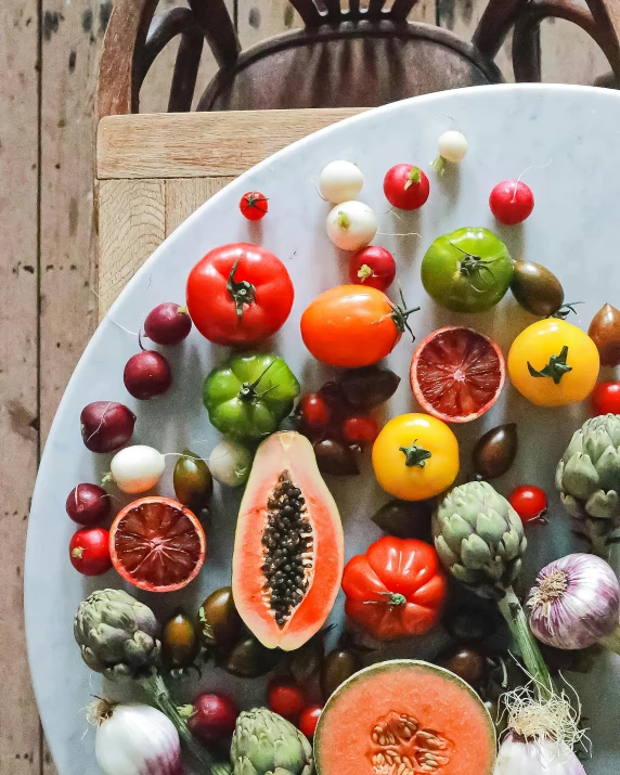 a white plate topped with assorted fruits and vegetables, pexels contest winner, renaissance, tomatoes, instagram story, tropical fruit, amanda lilleston