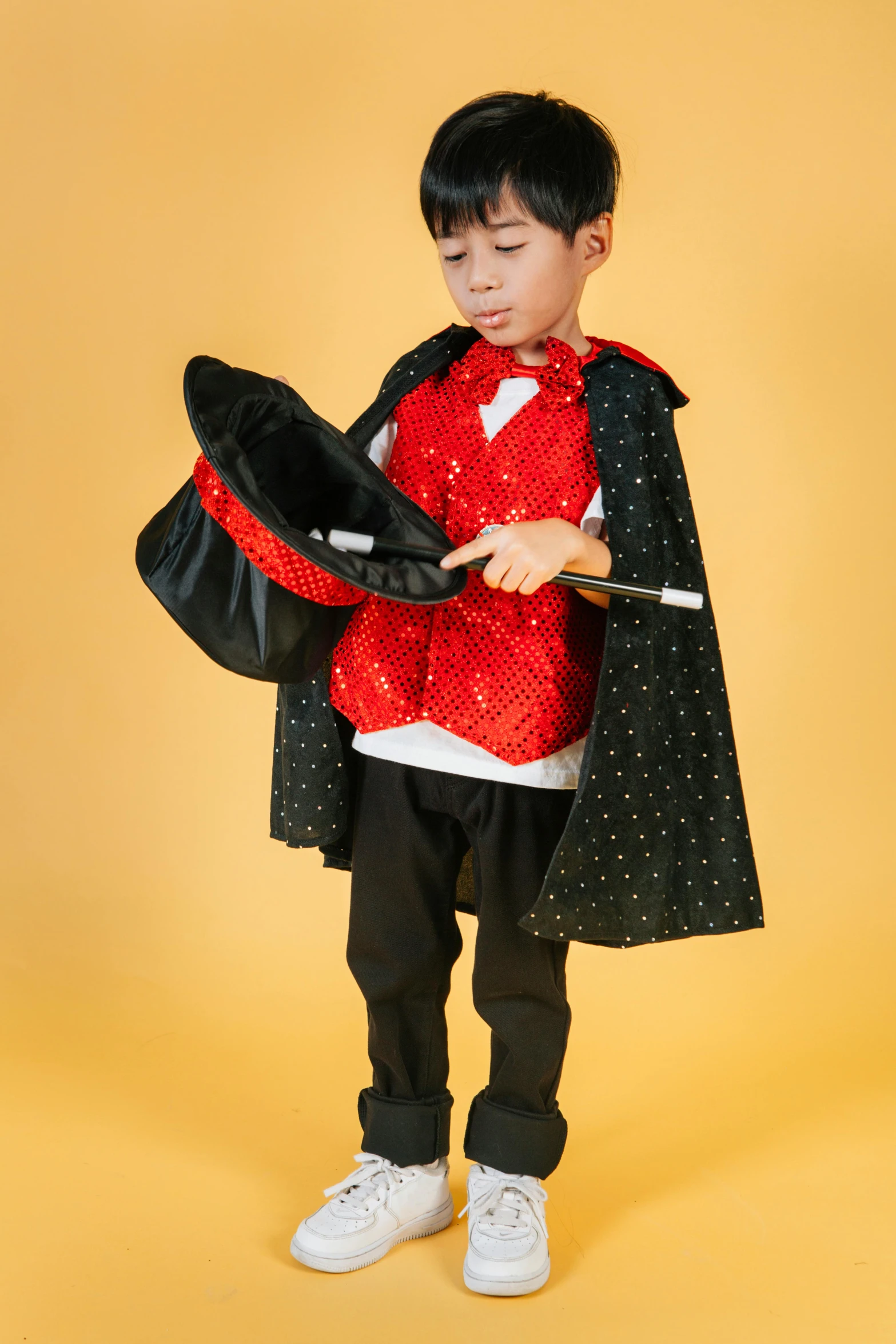 a little boy dressed up as a magician, by Basuki Abdullah, pexels, pop art, fullbody or portrait, or black, glitter, mary poppins