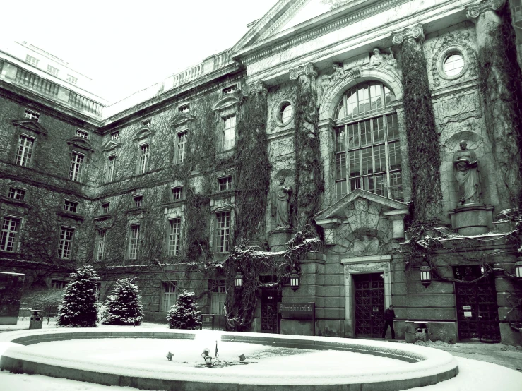 a building with a fountain in front of it, a photo, inspired by Wang Yi, paris school, snow camouflage, old library, desaturated, wetastudiofx