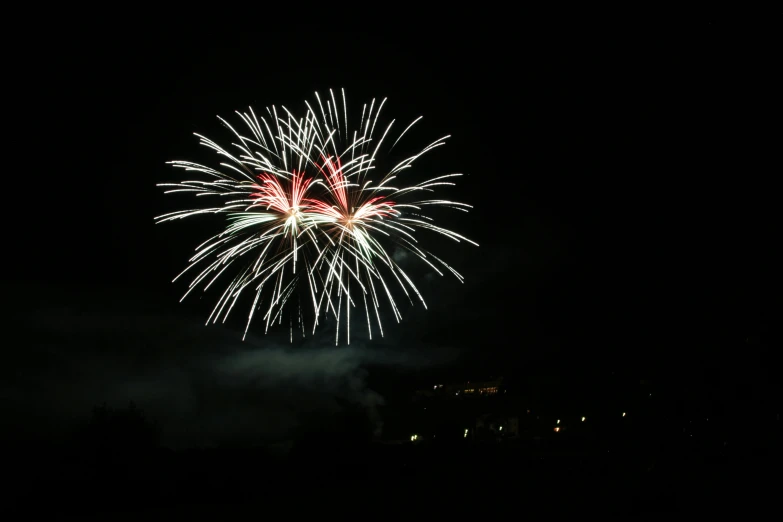 fireworks exploding in the night sky, a picture, unedited, grey, shot on sony a 7, image