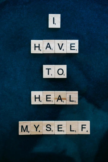 a scrabble that says i have to heal myself, a photo, pexels, centered full body, wall art, thumbnail, to